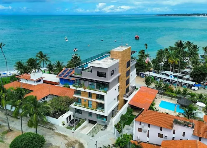 Flat pé na areia na praia de Porto de Galinhas com piscina privativa